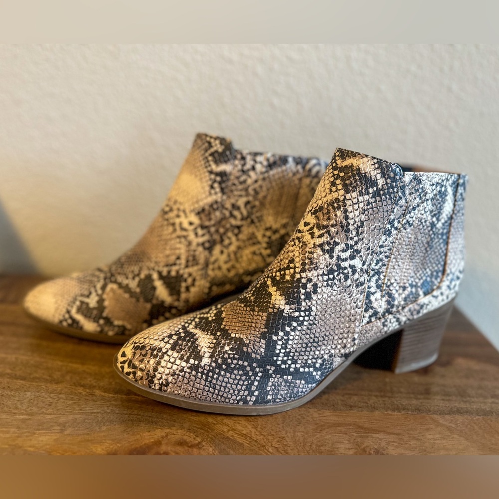 Ruby snakeskin slip on ankle bootie